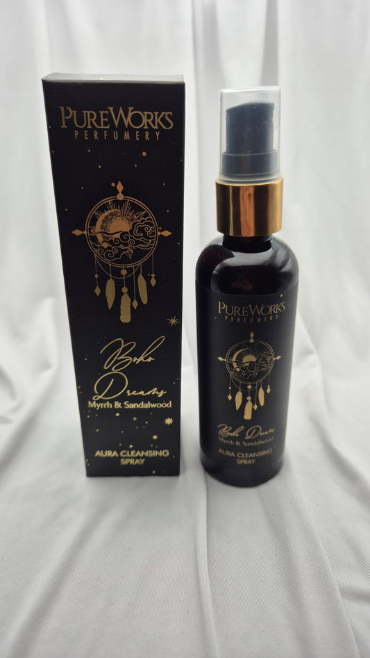 PureWorks Perfumery 'By The Dream' Myrtle & Sandalwood Aura Cleansing Spray, shown with its black packaging box and the dark glass spray bottle featuring gold lettering and a gold collar.